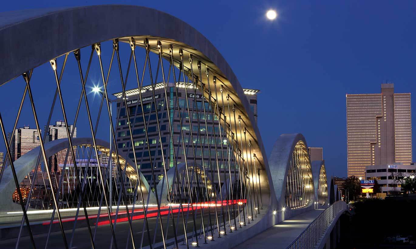 Arches of a bridge in Fort Worth, Texas at night