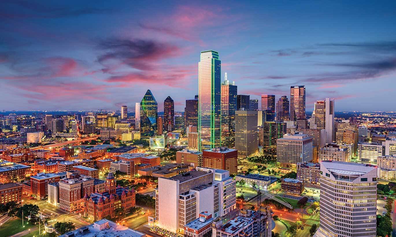 The Dallas skyline lit up in the evening