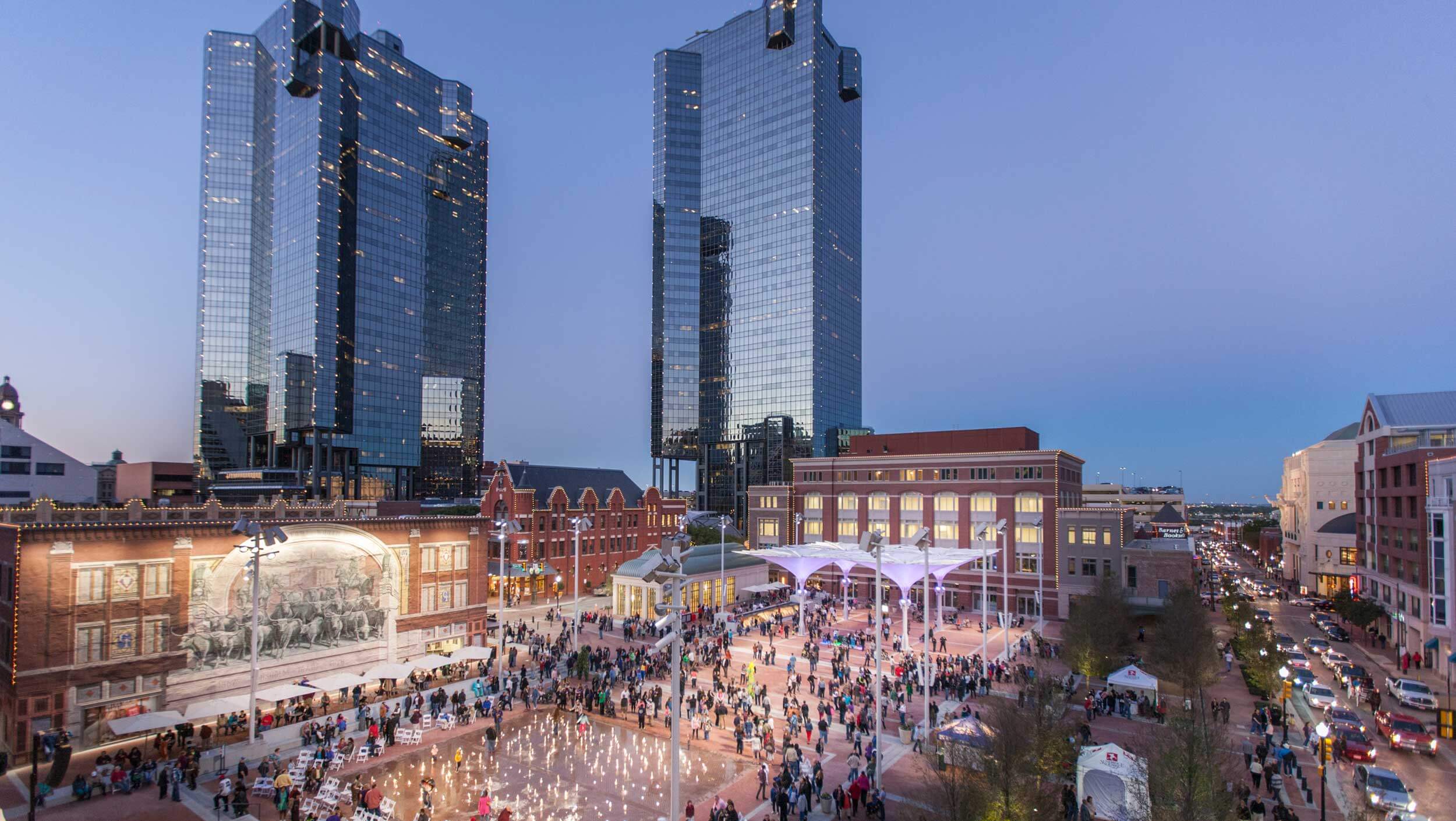 People mill around Sundance Square in Fort Worth, Texas to shop, eat and relax