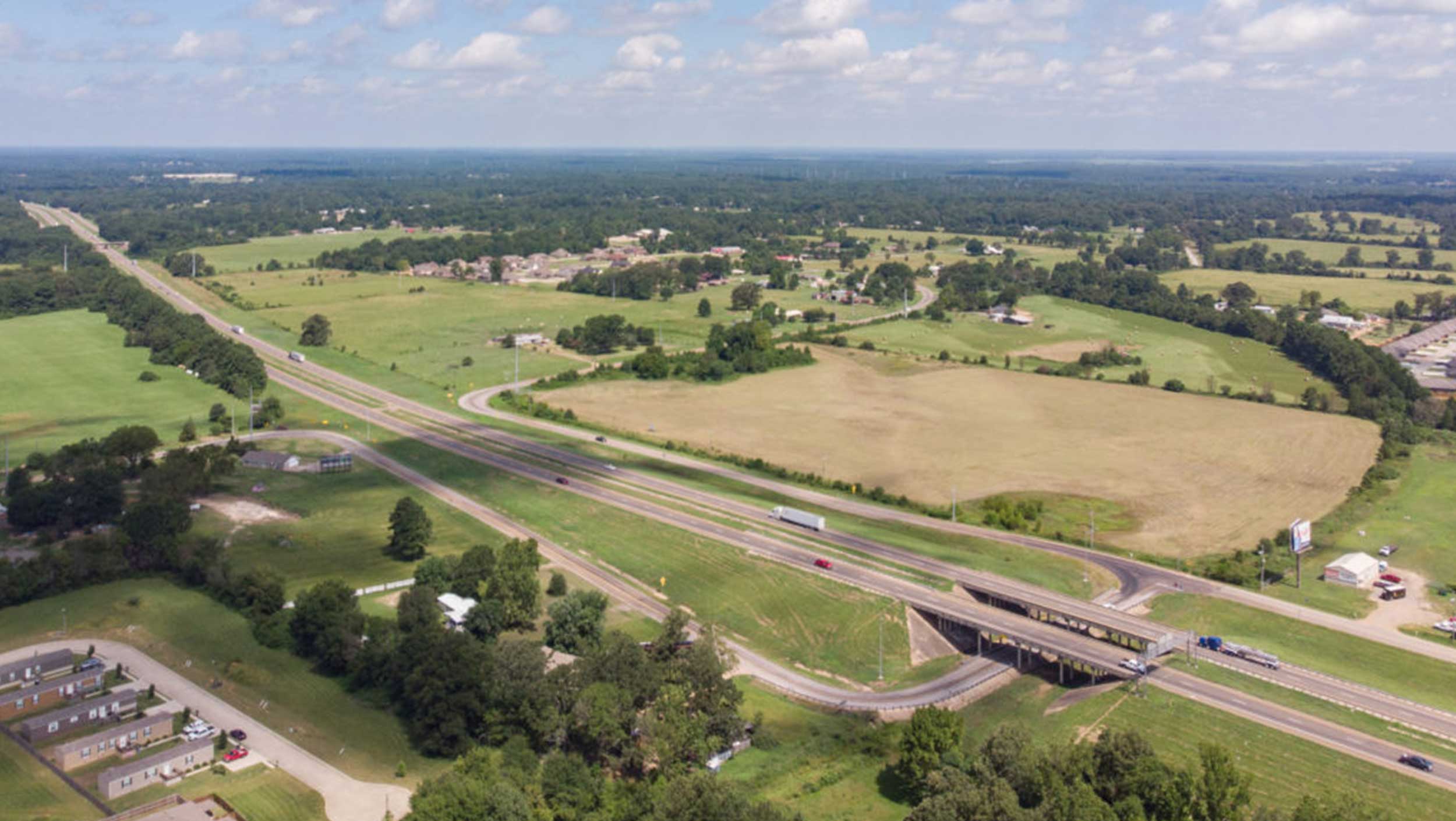 Aerial view of cars driving on major interstates in Texarkana, Texas