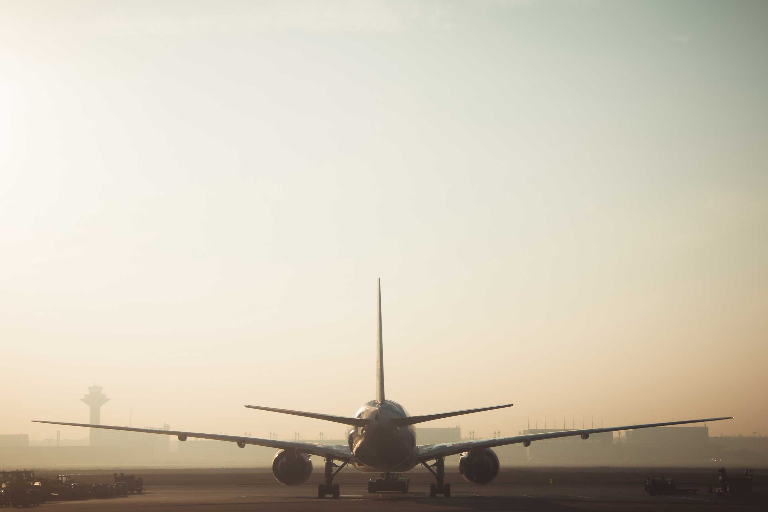 An airplane sits on a runway, prepared for takeoff.