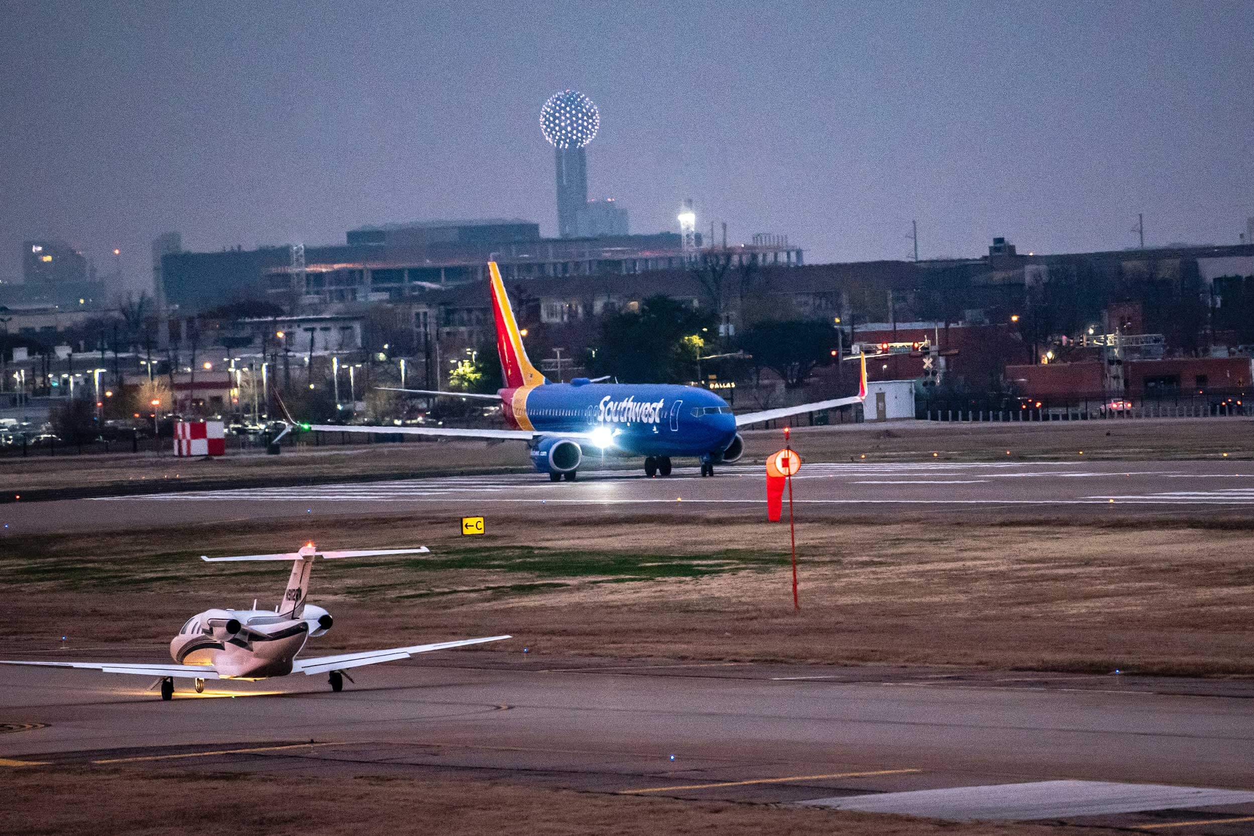 A Southwest plane lands on the tarmac