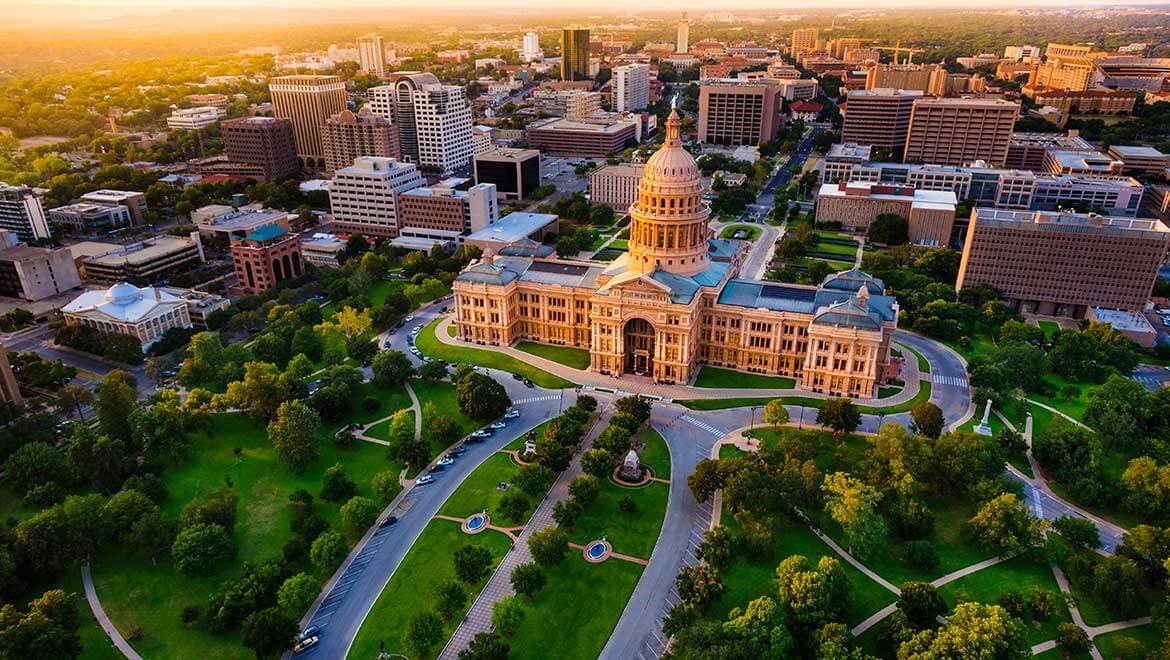 aerial view of Austin Capitol building at sunset