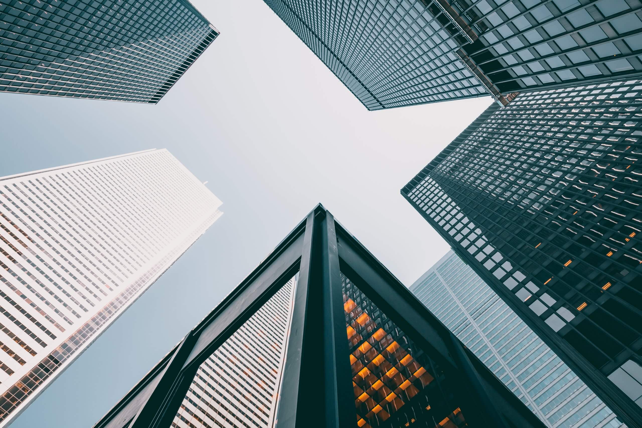 View of skyscrapers from ground level looking upward