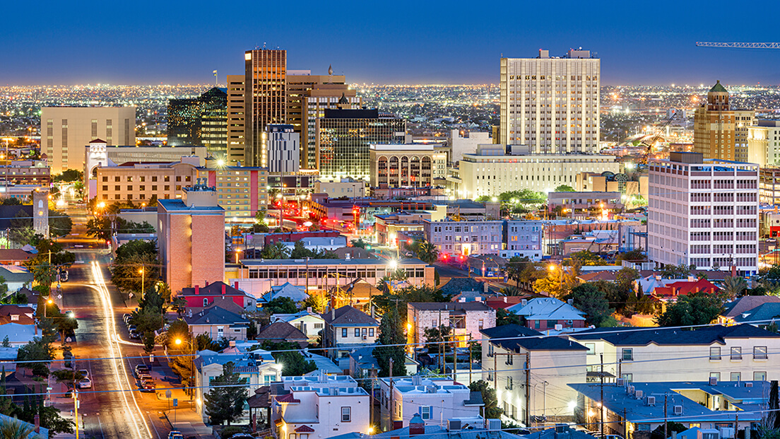 El Paso, Texas, USA downtown city skyline at dusk with Juarez, Mexico in the distance