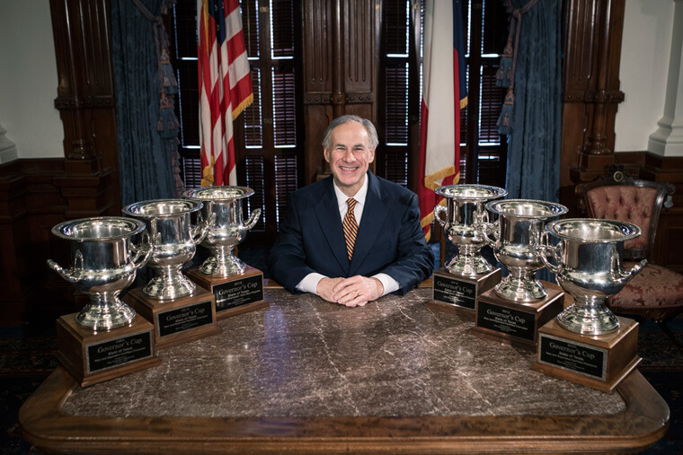 Governor Abbott with the Texas Governor Cups in Capitol