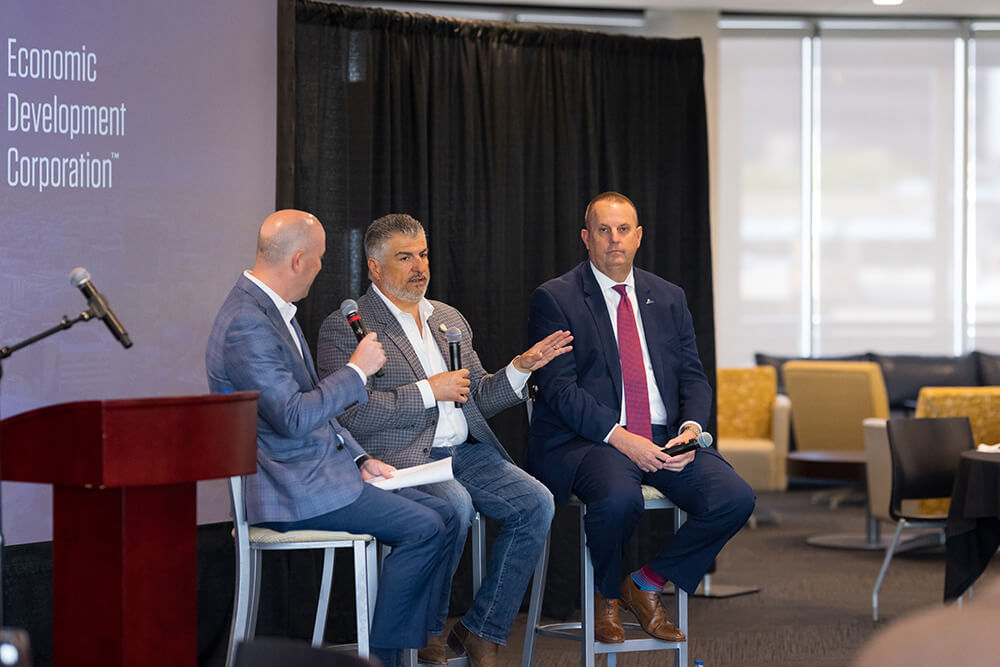 Gilbert de Cardenas, CEO of Cacique Foods and Kevin Carter, president & CEO of AEDC chat with TxEDC