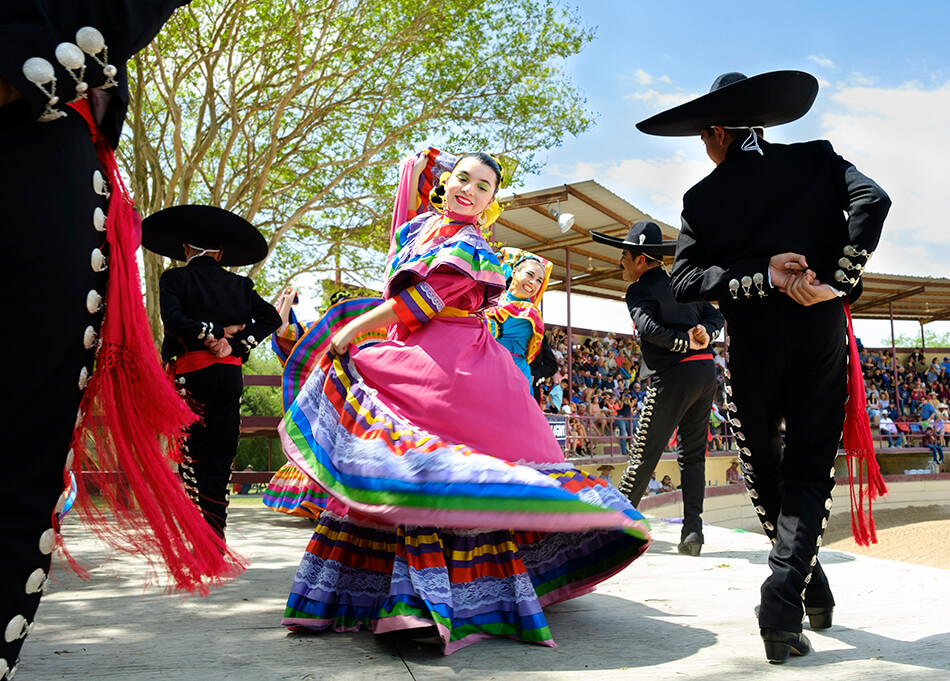 Dancers in traditional Mexican dress perform at Fiesta in San Antonio